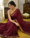 Maroon red checks line saree with golden zari