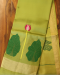 Green jamdani weave lotus motif lightweight linen silk saree