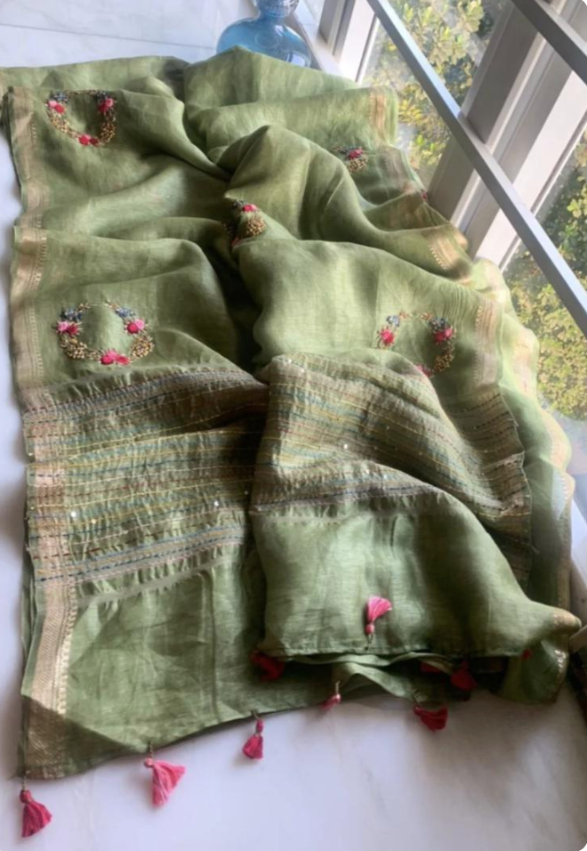 flatlay green linen saree