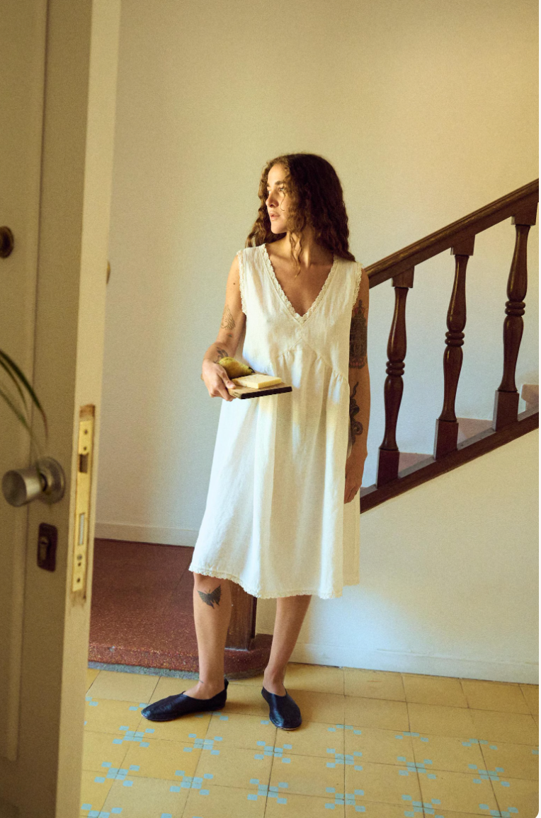 view from far near stairs white midi dress neolinen